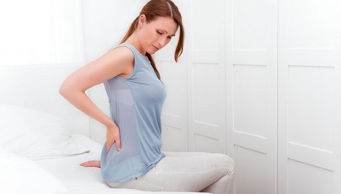 Woman worries about back pain